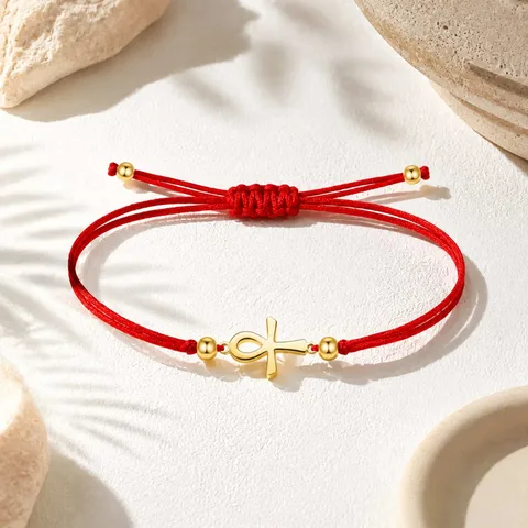 PULSERA CRUZ EGIPCIA DORADO DE HILO EN.ROJO