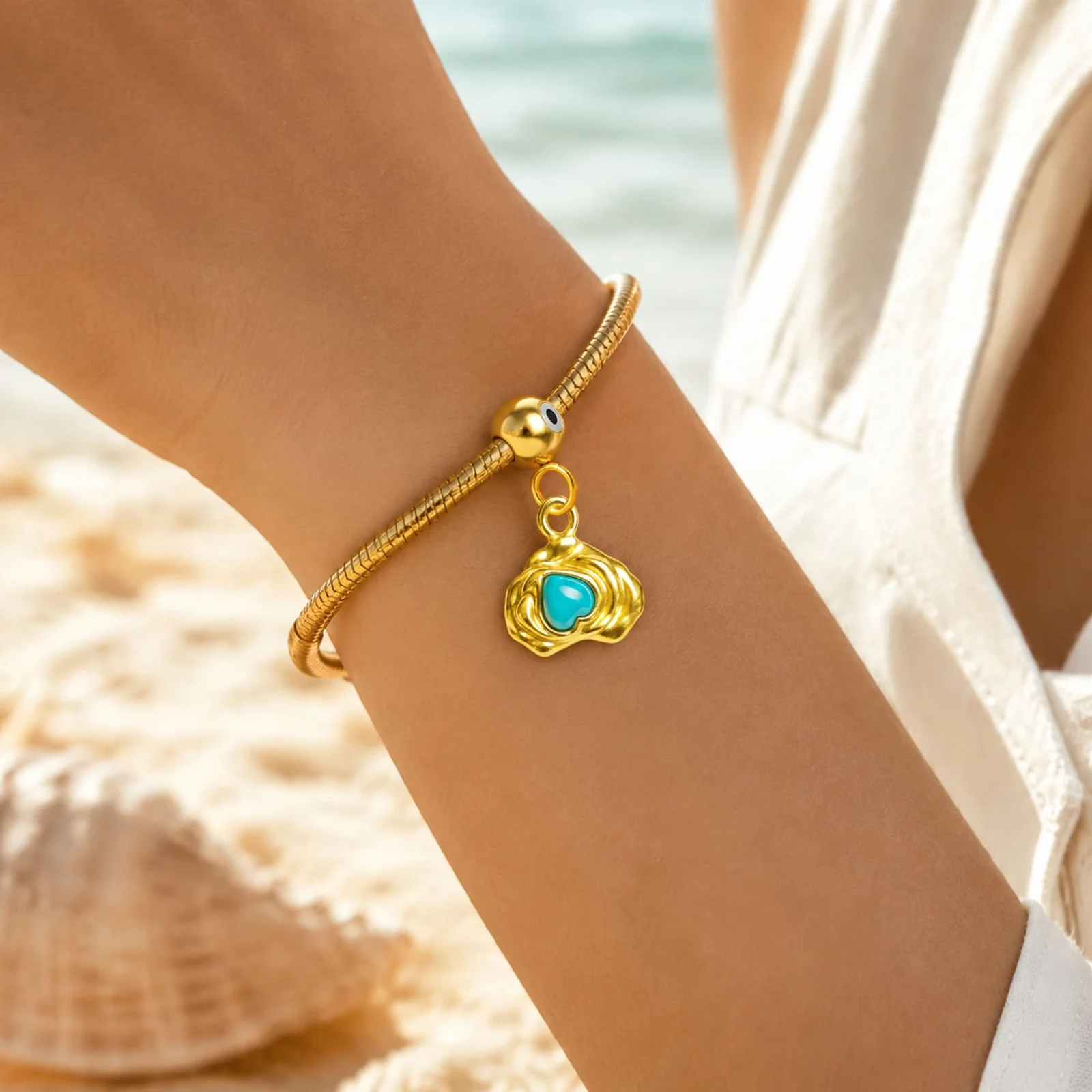 CHARM ACERO DORADO CHAPADO ORO 14 K-CON BOLA DE GOMA