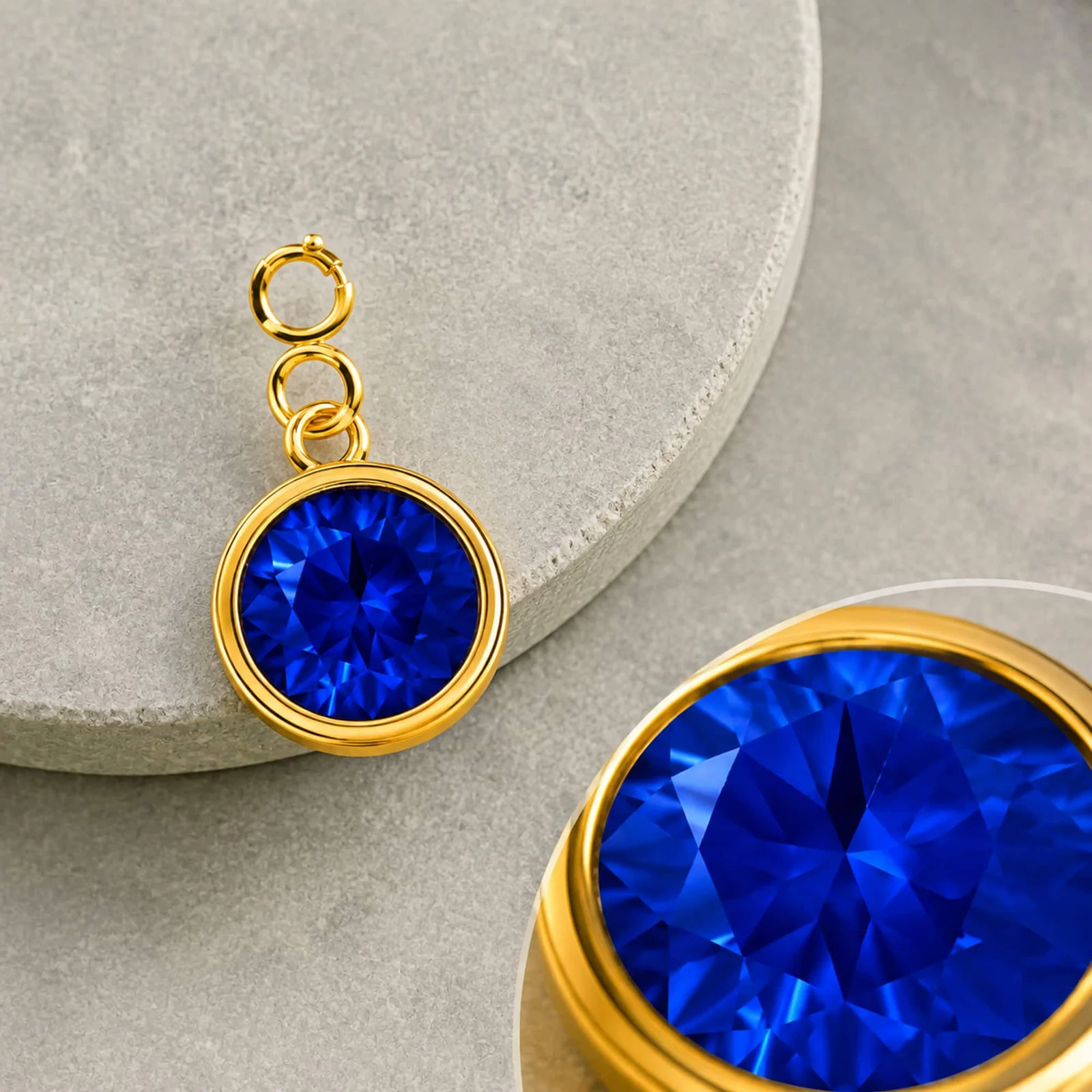 CHARM ACERO DORADO CON PIEDRA NACIMIENTO DE SEPTIEMBRE-CON CIERRE