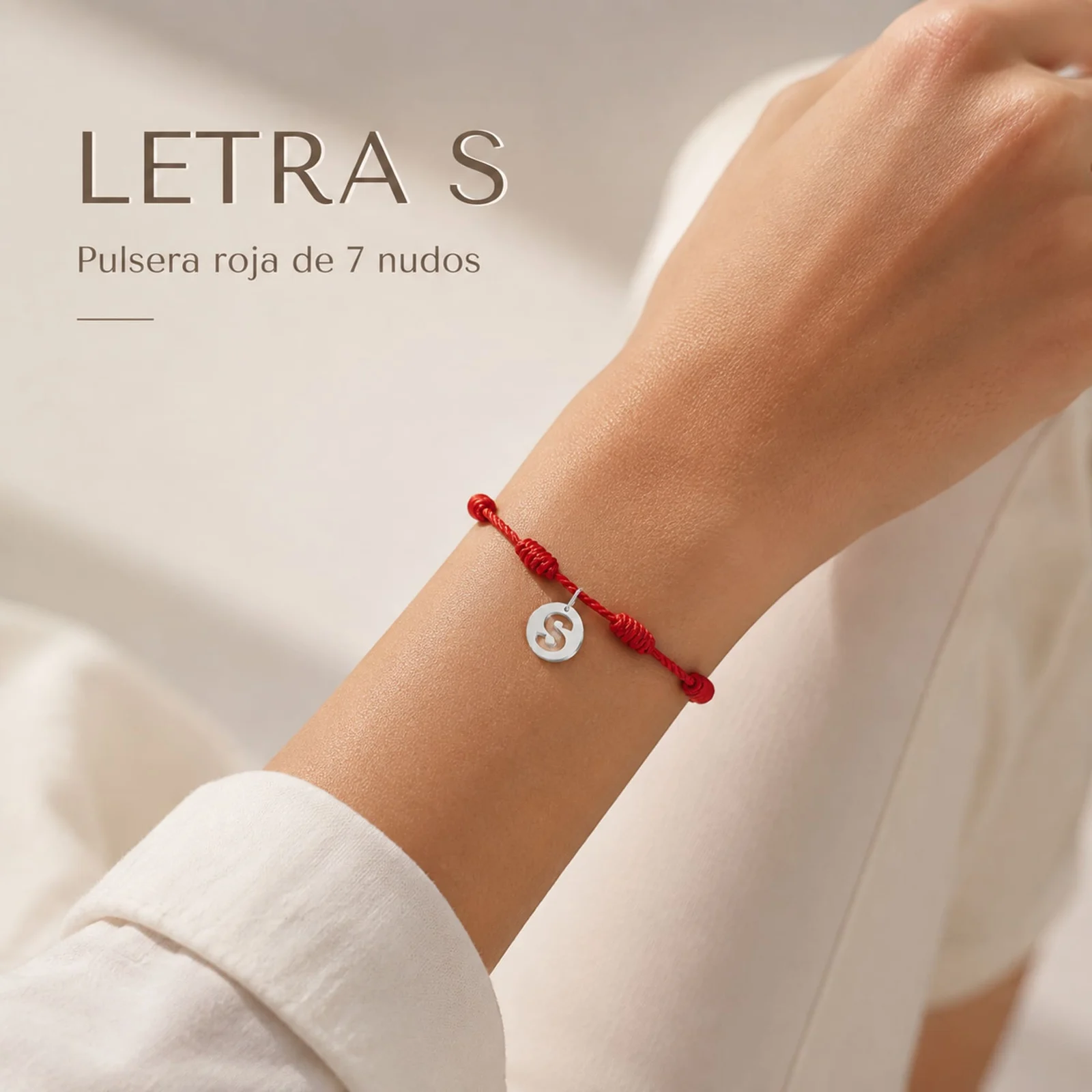 PULSERA 7 NUDOS CON LETRA S COLOR PLATEADO