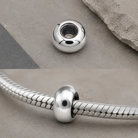 BOLA PLANO 6MM ACERO PLATEADO CON GOMA PARA FIJAR CHARM EN CADENA DE SERPIENTE